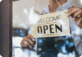 Shopkeeper opening store