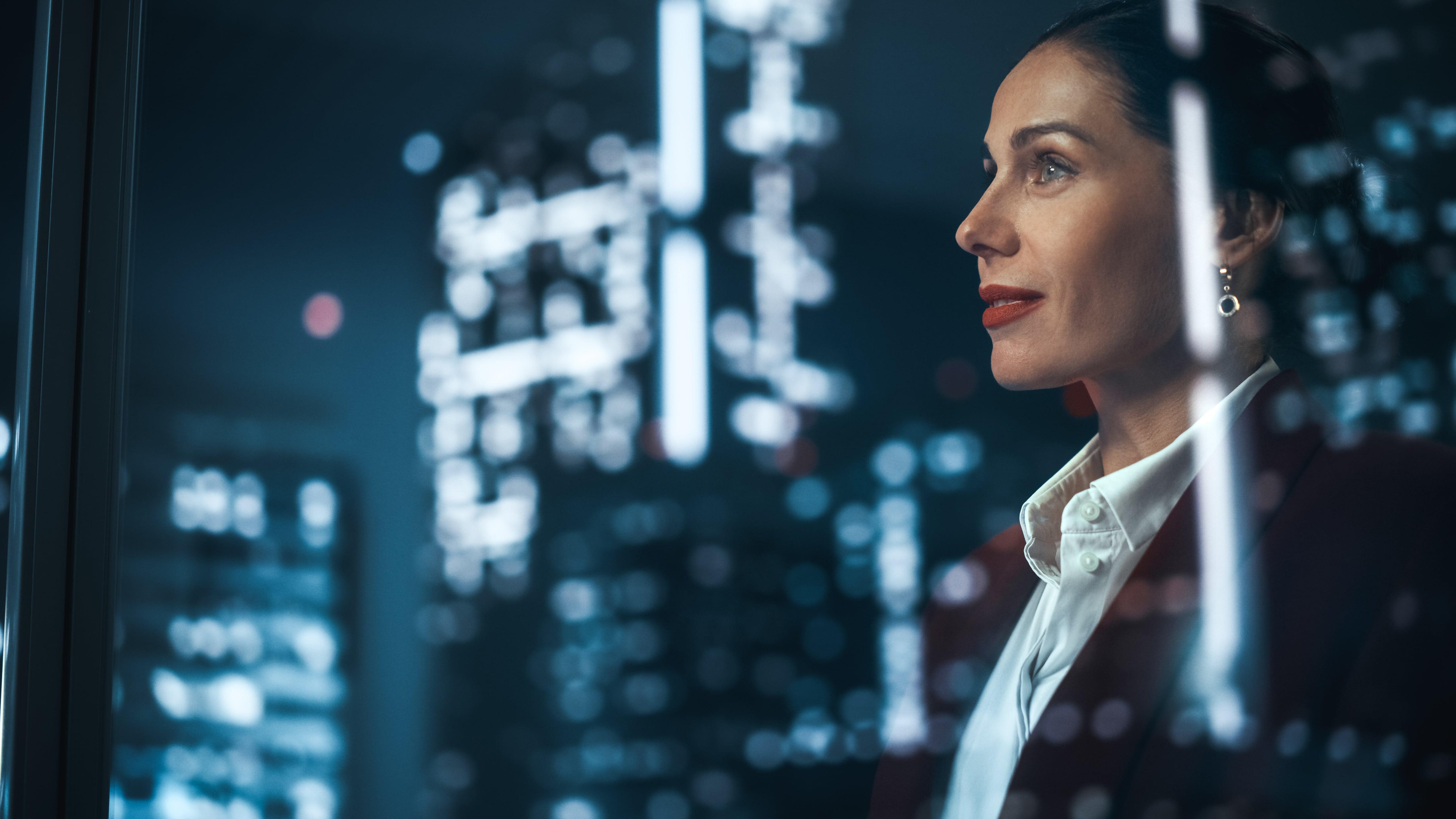 Woman looking out of window